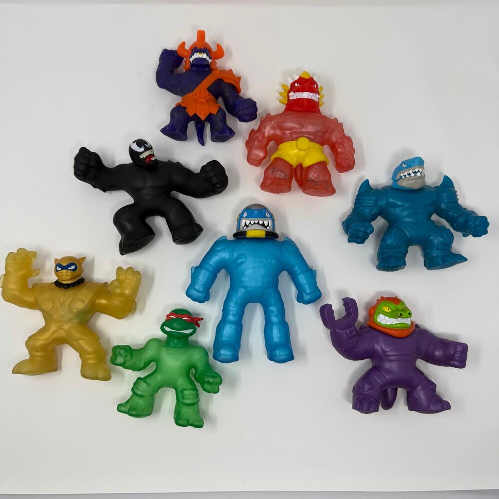 Lot of 8 Stretchy Superhero Monster Action Figures